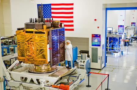 A $245 million Boeing GPS  2F spacecraft under final test before shipment to Cape Canaveral. Photo Credit: Boeing