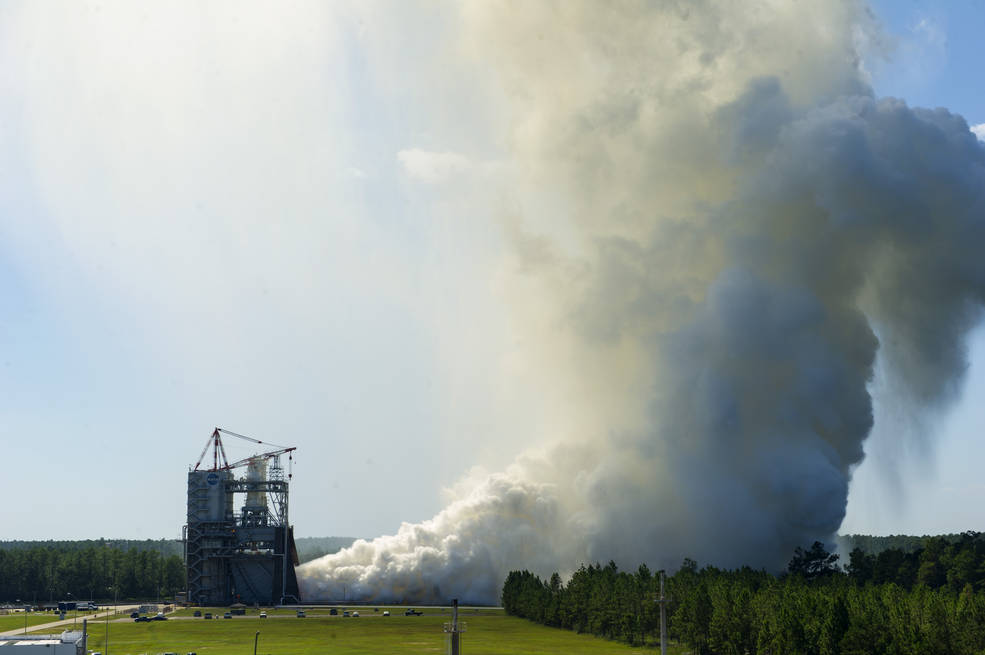 The RS-25 engine fires up for a 535-second test Aug. 27, 2015 at NASA's Stennis Space Center near Bay St. Louis, Mississippi. This is the final in a series of seven tests for the development engine, which will provide NASA engineers critical data on the engine controller unit and inlet pressure conditions. Credits: NASA