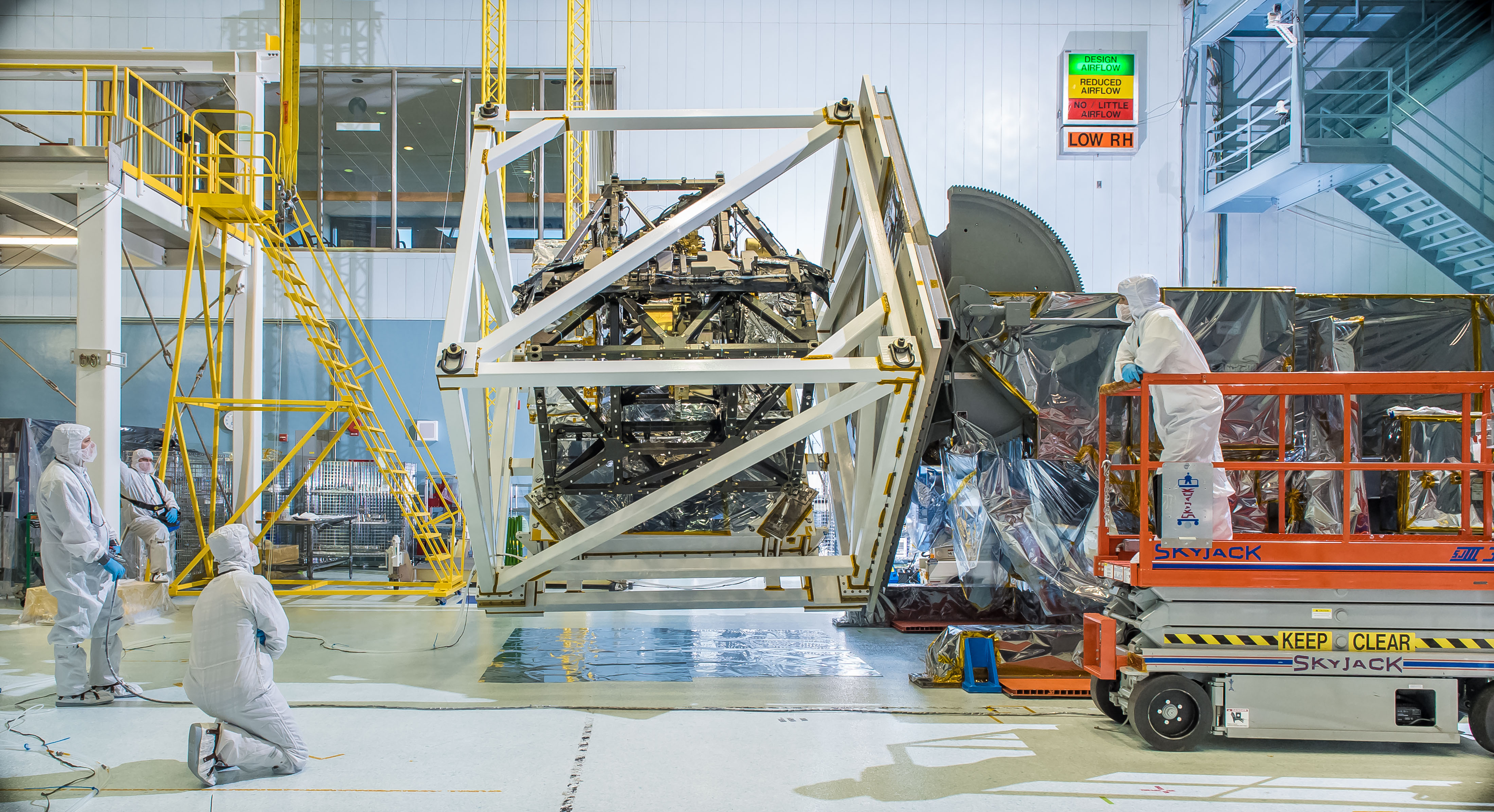 NASA photo, 2014: "The James Webb Space Telescope's ISIM structure recently endured a 'gravity sag test' as it was rotated in what looked like giant cube in a NASA clean room." The ISIM is entering its final round of environmental tests. Photo Credit: NASA/C. Gunn