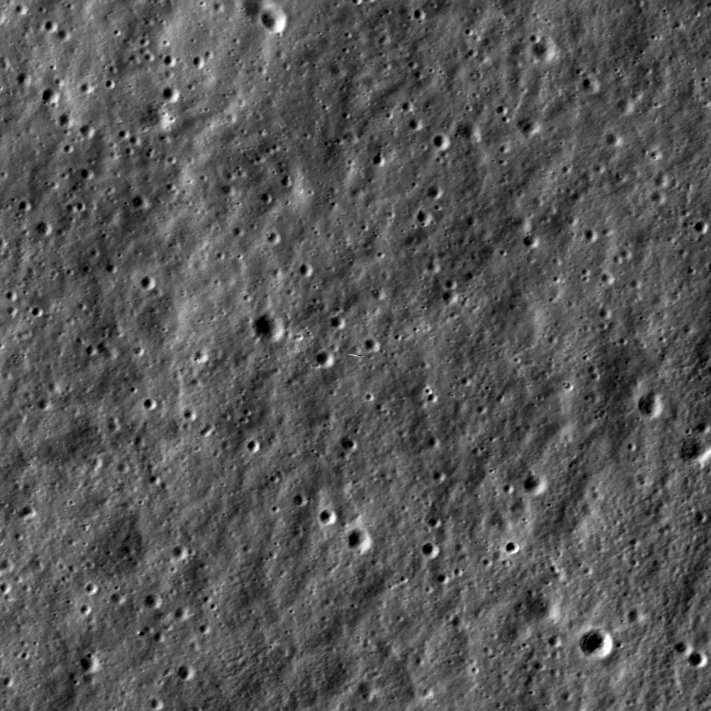 Image taken by the Lunar Reconnaissance Orbiter (LRO) showing LADEE as it orbited above the Moon's surface (small object near center of image). Image Credit: NASA/Goddard/Arizona State University