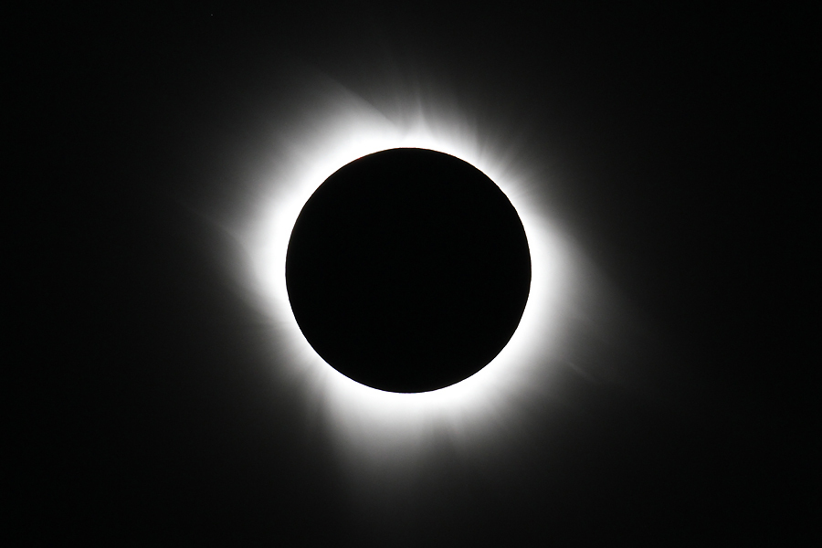 A total eclipse of the Sun, showing the Sun's atmosphere, or corona, stretching out, which is not normally visible during daylight. Photo Credit: Fred Espenak/NASA's Goddard Space Flight Center