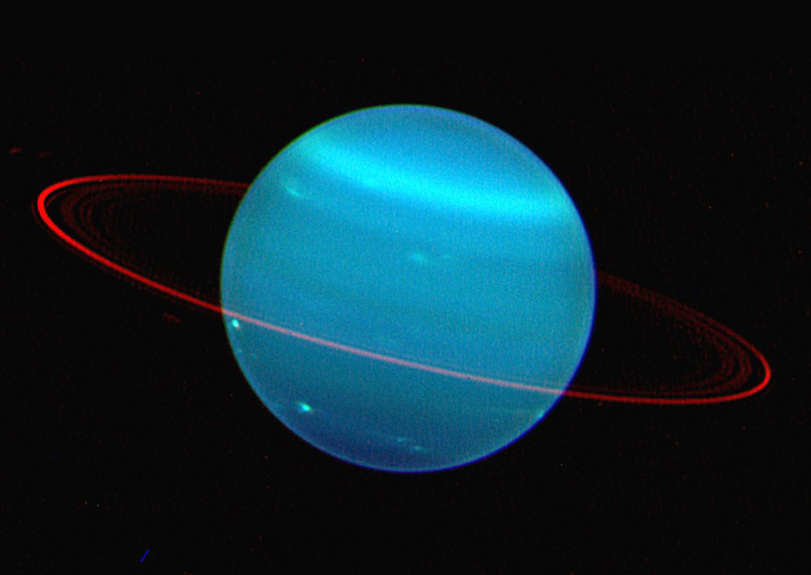 The two sides of the planet Uranus, as viewed in this composite image, by the Keck Telescope at near infrared wavelengths. These new images of the seventh planet from the sun promise to help scientists unravel the mysteries of the weather on Uranus. Used with permission by: UW-Madison University Communications 608/262-0067 Photo by: courtesy Lawrence Sromovsky/UW-Madison Space Science and Engineering Center. Date: 10/04 File#: scan provided