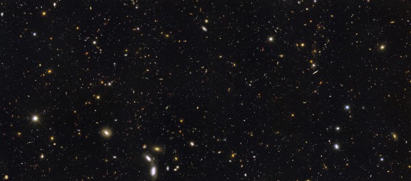 A panoramic, full-color view of the Hubble deep-sky field where the difusse extragalactic background light was observed from some of the first, primordial galaxies in the Universe. The image shows cosmic objects out to a distance of 12 billion light-years away. Image Credit: NASA, ESA, R. Windhorst, S. Cohen, M. Mechtley, and M. Rutkowski (Arizona State University, Tempe), R. O'Connell (University of Virginia), P. McCarthy (Carnegie Observatories), N. Hathi (University of California, Riverside), R. Ryan (University of California, Davis), H. Yan (Ohio State University), and A. Koekemoer (Space Telescope Science Institute)
