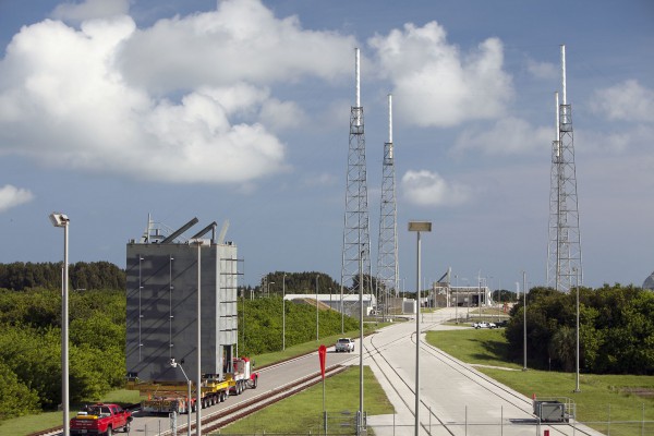 The first tier of the Crew Access Tower is moved from its construction yard to Space Launch Complex-41 at Cape Canaveral Air Force Station in Florida. It will take seven tiers, as each segment is called, to form the 200-foot-tall tower that will be mounted beside the Atlas V launch pad already in place at SLC-41. The tower is being assembled at the pad so astronauts and ground support teams can have access to the Boeing CST-100 Starliner as it stands poised for liftoff. Photo Credit: NASA/Dmitrios Gerondidakis