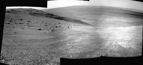 A collage of three raw images of Marathon Valley' northern side (at left), taken by Opportunity's navigation cameras on August 2. The distant floor of Endeavour Crater is clearly visible at the center. Image Credit: NASA/JPL-Caltech/Cornell Univ./Arizona State Univ.