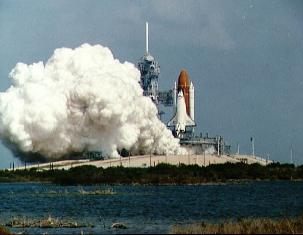 For the final time in the 30-year shuttle program, Endeavour's engines blaze for their Flight Readiness Firing (FRF) on 6 April 1992. Photo Credit: NASA