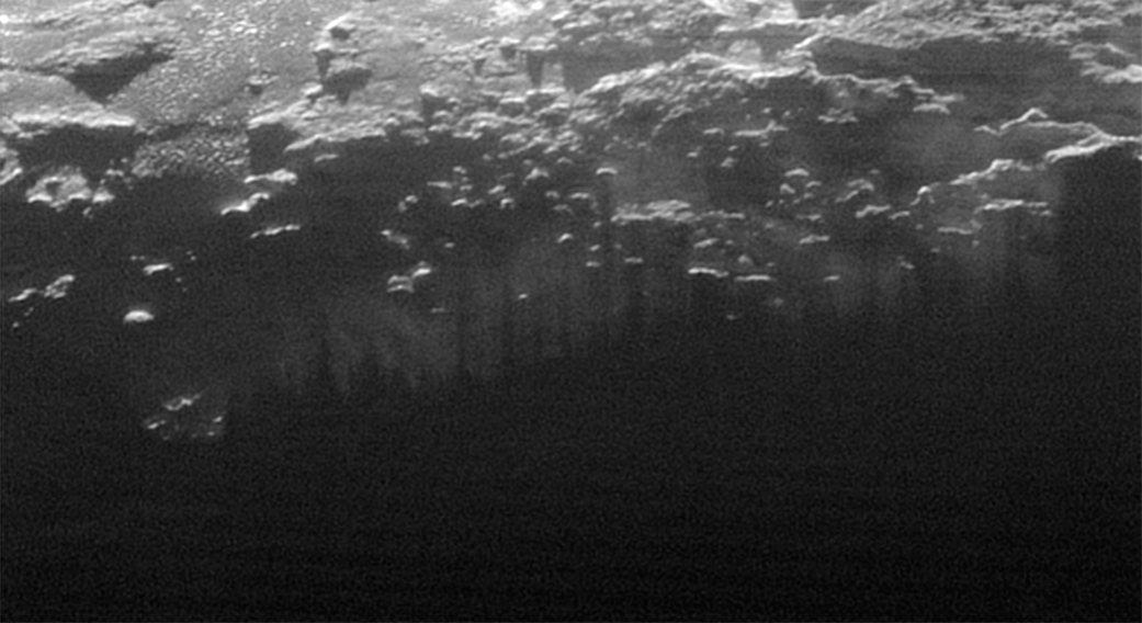 An even closer view from the panorama, showing low-level surface haze or fog. Image Credit: NASA/JHUAPL/SwRI