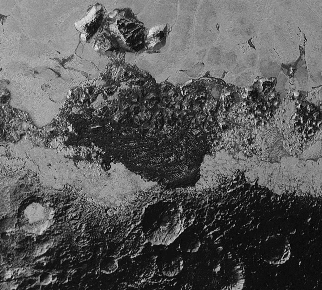 New high-resolution image of darker, ancient terrain and lighter, smoother and younger terrain on Pluto. Image Credit: NASA/Johns Hopkins University Applied Physics Laboratory/Southwest Research Institute
