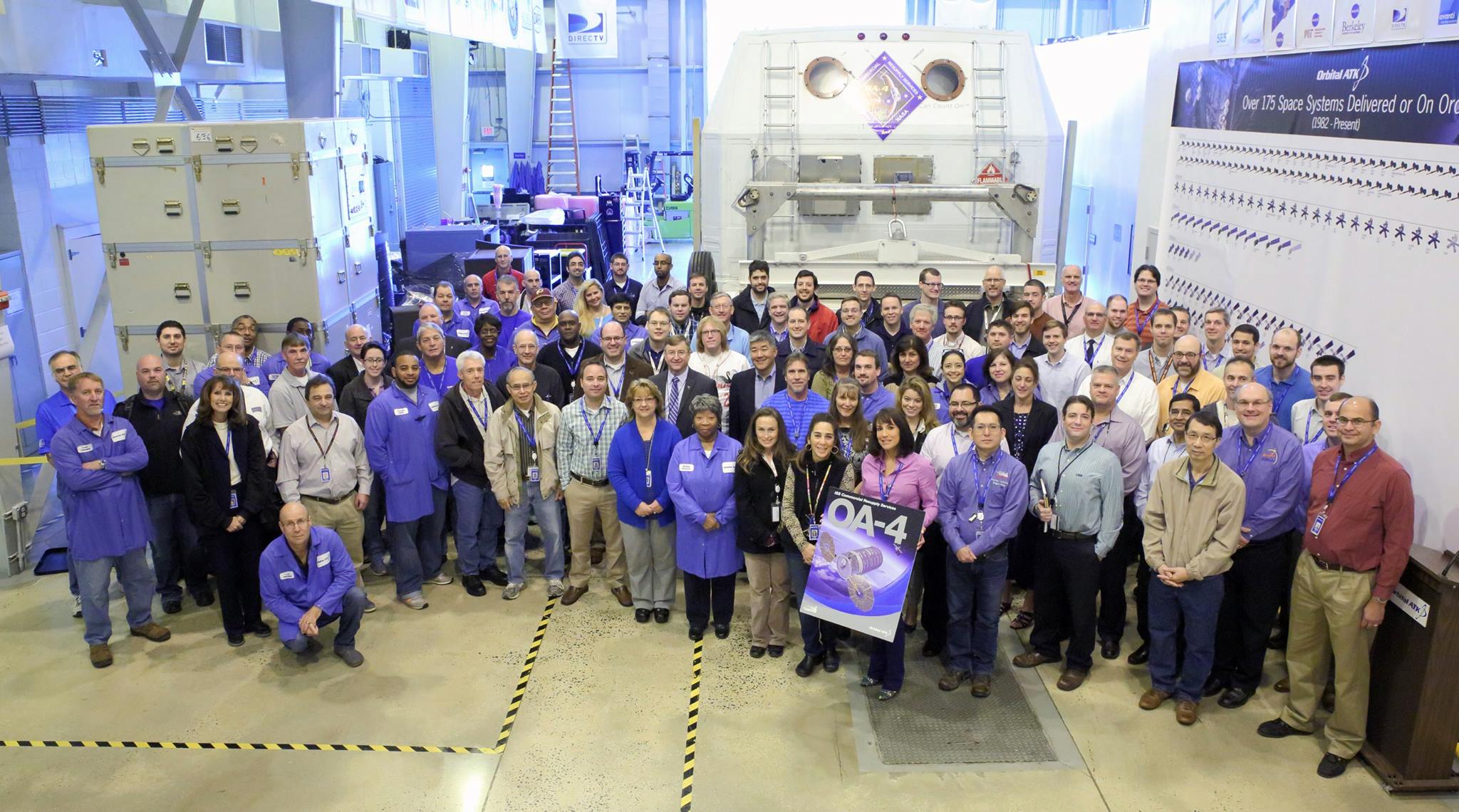Orbital ATK employees celebrate the delivery of OA-4's prime components to KSC. Photo Credit: Orbital ATK