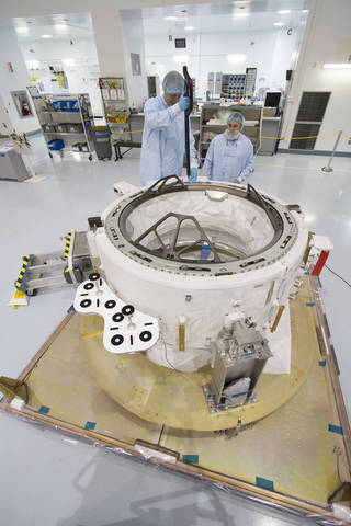 The second International Docking Adapter (IDA-2) will provide the primary docking interface for Commercial Crew. The adapter was built to the specifications of the International Docking Standards, and it will be a connection point for commercial crew spacecraft visiting the orbiting laboratory. Photo Credit: NASA/Cory Huston 