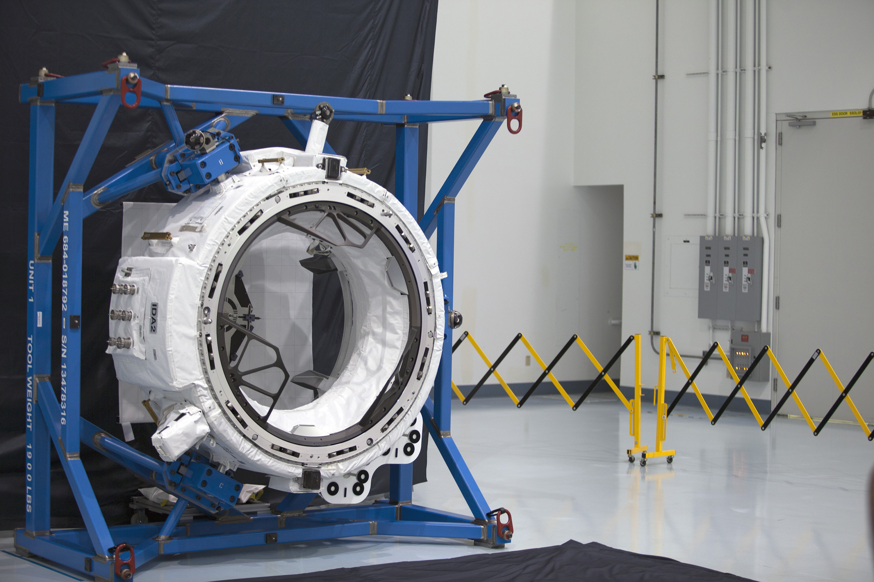 Engineers in the Space Station Processing Facility at NASA’s Kennedy Space Center, Florida, recently tested the mechanisms that will connect future commercial crew spacecraft with the second International Docking Adapter. IDA-2, as it’s called, will be taken to the space station on a future cargo resupply mission. It will be one of two connection points for commercial crew spacecraft visiting the orbiting laboratory. The systems and targets for IDA-2 are set to be put through extensive tests with both Boeing’s CST-100 and SpaceX’s Crew Dragon before the adapter is loaded for launch. Caption and Credit: NASA/Charles Babir 