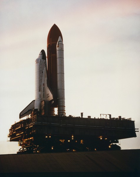 Beautiful view of Challenger, rolling out to Pad 39A for the last time. Her next mission, tragic 51L, would fly from Pad 39B. Photo Credit: NASA, via Joachim Becker/SpaceFacts.de