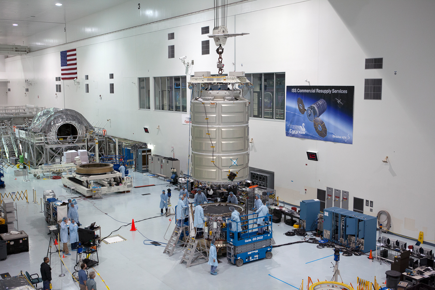 Engineers this week completed connecting the Pressurized Cargo Module with the Service Module to form the Cygnus spacecraft that will ferry more than 7,000 pounds of supplies, equipment and experiments to the International Space Station for NASA in December. The OA-4 mission is scheduled to launch atop a ULA Atlas-V rocket from Cape Canaveral, Fla. NET Dec. 3, 2015. Photo Credit: NASA