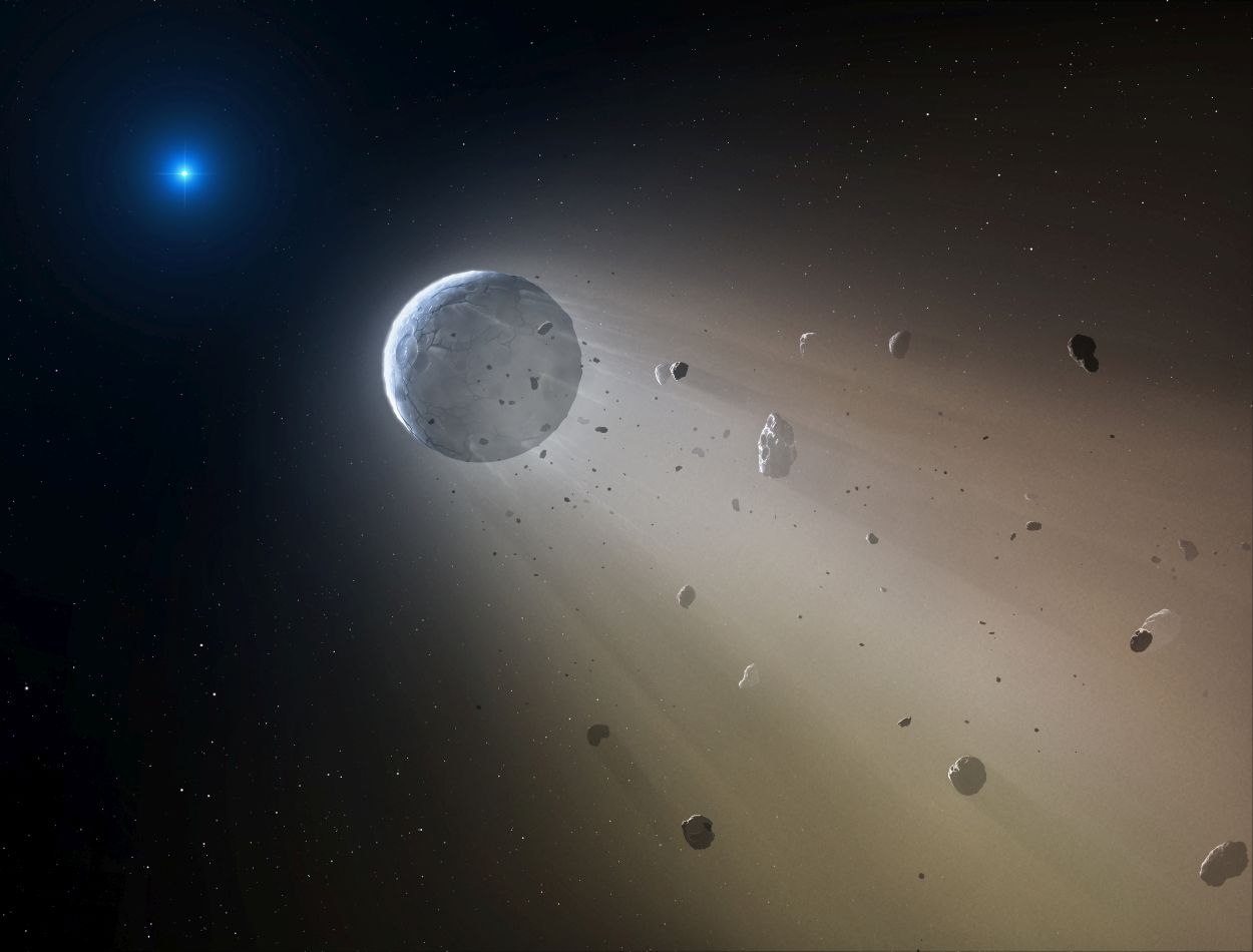 An artist's concept of a minor planet being disintegrated by a white dwarf star. New observations by NASA's Kepler space telescope have indicated that this indeed takes place around WD 1145+017, a white dwarf located 570 light-years away. Image Credit: CfA/Mark A. Garlick