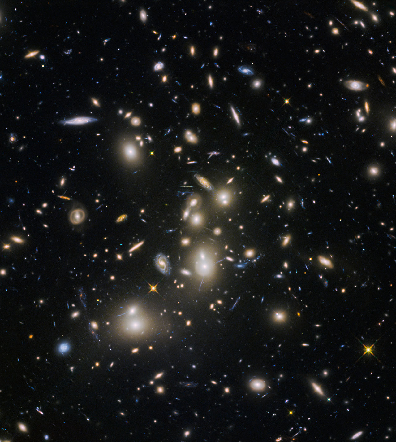 Wider view showing galaxy cluster Abell 2744. Image Credit: NASA/ESA/HST Frontier Fields team (STScI)