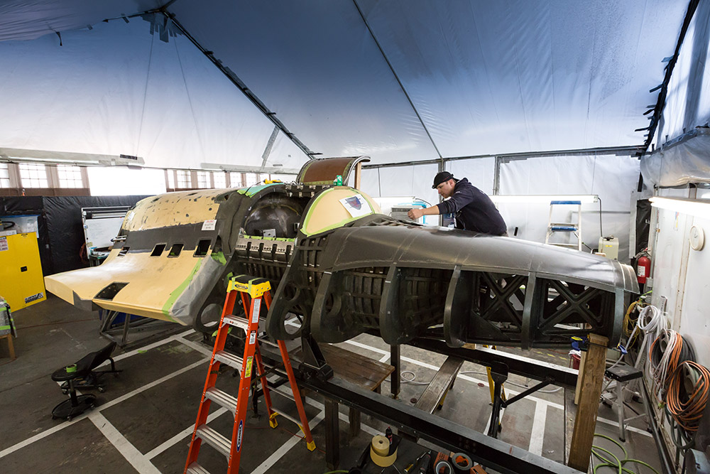 XCOR engineers are hard at work assembling and testing critical components of the Lynx reusable launch vehicle. Photo Credit: XCOR Aerospace
