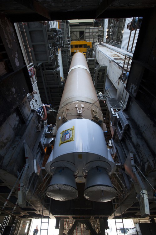The RD-180 business end of a ULA Atlas-V booster, as the rocket is raised vertical at Cape Canaveral Launch Complex 41 for a scheduled Dec. 3 launch with the Cygnus spacecraft on a resupply mission to the ISS. Photo Credit: NASA