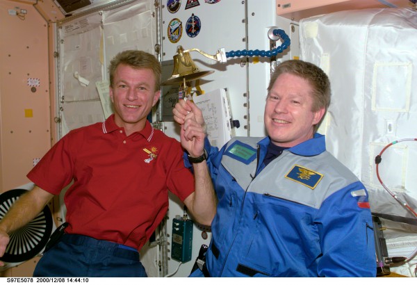 Both STS-97 Commander Brent Jett (left) and Expedition 1 Commander Bill Shepherd were active-duty U.S. Navy officers and observed the tradition of ringing the ship's bell as the visiting crew arrived. Photo Credit: NASA