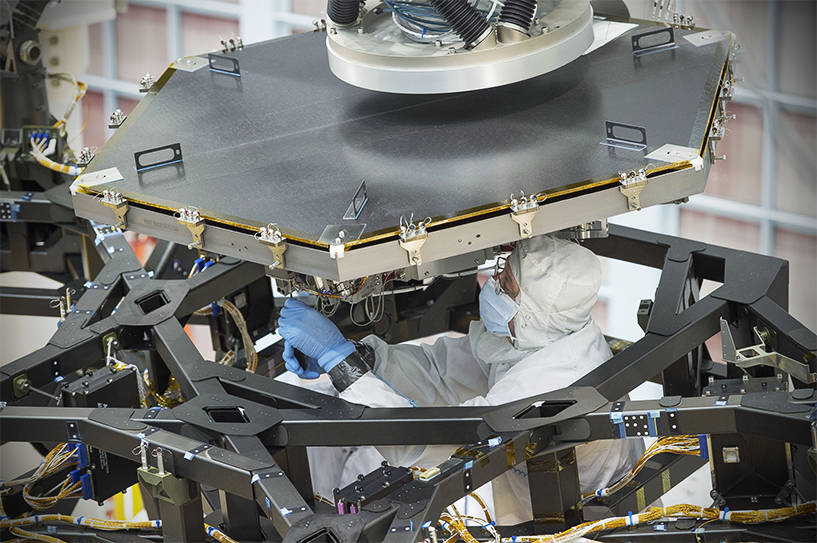 The first of 18 mirrors being installed in the James Webb Space Telescope. Photo Credit: NASA/Chris Gunn