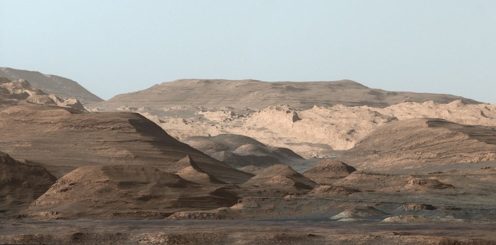 Stunning view (white-balanced) of the mesas and buttes in the foothills of Mount Sharp, past the dunes. Image Credit: NASA/JPL-Caltech/MSSS 
