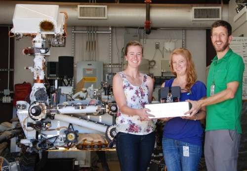 JPL researchers Jessica Creamer, Fernanda Mora and Peter Willis (left to right) pose with the Chemical Laptop. Photo Credit: NASA/JPL-Caltech
