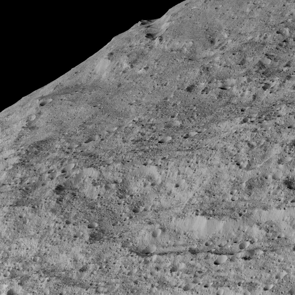 Another view, showing an area in the southern mid-latitudes of the dwarf planet. The location is near around a crater chain called Samhain Catena, at approximately 23.2 south latitude, 216.8 east longitude. Image Credit: NASA/JPL-Caltech/UCLA/MPS/DLR/IDA