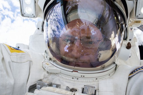 Expedition 46 Commander Scott Kelly snaps a quick selfie during today's EVA. Photo Credit: NASA