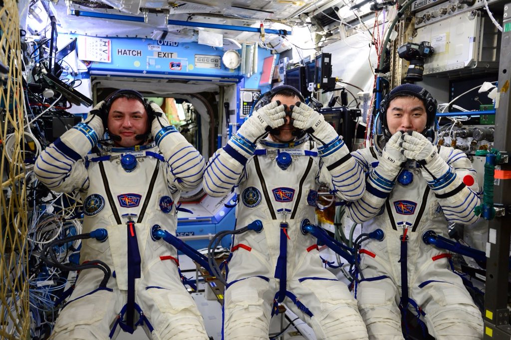 Goofing around during a leak check of their Sokol ("Falcon") launch and entry suits, Lindgren, Kononenko and Yui present themselves as Hear No Evil, See No Evil and Speak No Evil. Photo Credit: Kjell Lindgren/Scott Kelly/NASA/Twitter