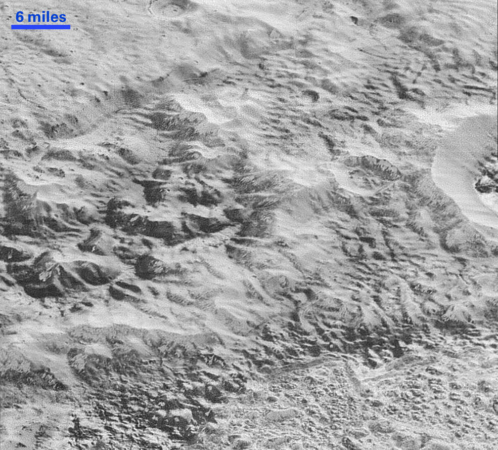 The "badlands" on Pluto, showing evidence of erosion and faulting. Image Credit: NASA/JHUAPL/SwRI
