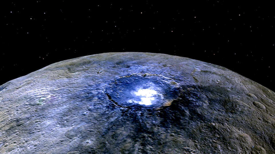 False color view of Occator crater on Ceres, showing the unusual brights spots. Image Credit: NASA/JPL-Caltech/UCLA/MPS/DLR/IDA