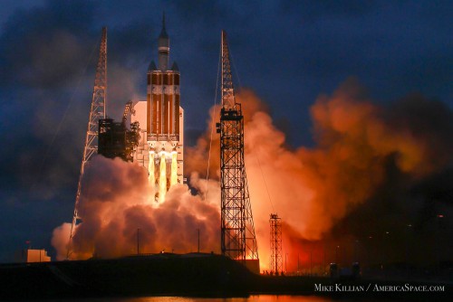 A ULA Delta-IV Heavy launching NASA's Orion crew capsule on its first orbital flight test in late 2014, EFT-1. Photo Credit: Mike Killian / AmericaSpace
