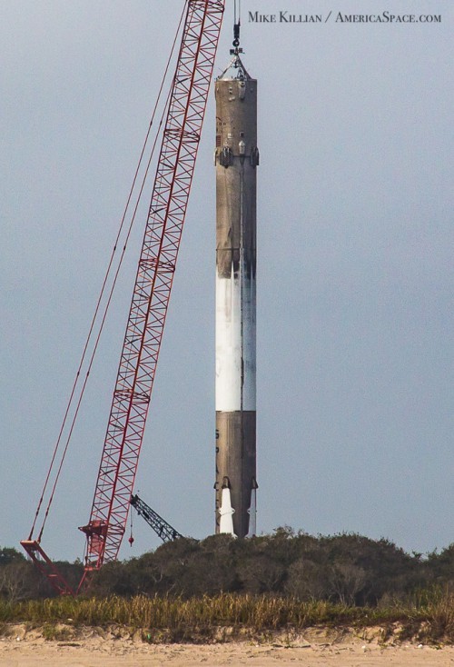 SpaceX's Falcon-9 first stage OG-2 booster back on solid ground after landing from launching the OG-2 mission in Dec. 2015. Photo Credit: Mike Killian / AmericaSpace