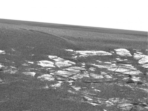 One of the first views inside Eagle crater, which Opportunity landed inside in 2004. The bright patches of bedrock provided some of the first clues about past water in this region. Photo Credit: NASA/JPL-Caltech