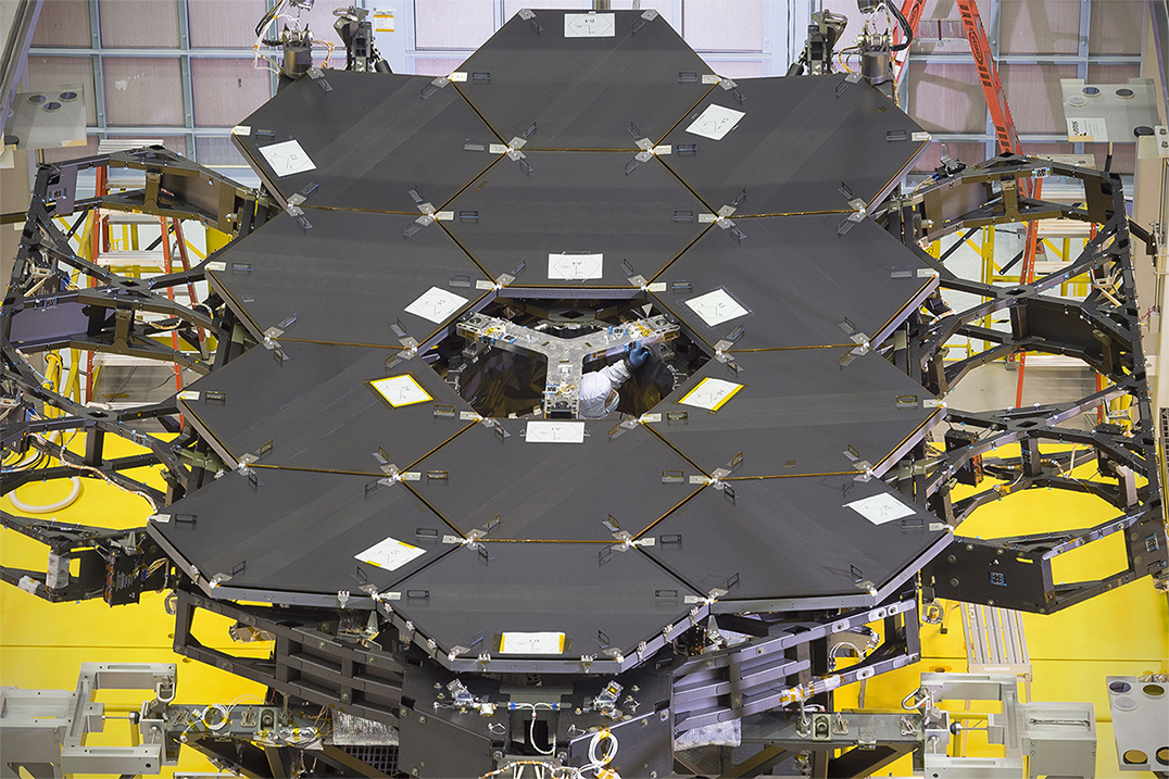 From NASA: "One dozen (out of 18) flight mirror segments that make up the primary mirror on NASA's James Webb Space Telescope have been installed at NASA's Goddard Space Flight Center." Photo Credit: NASA/Chris Gunn