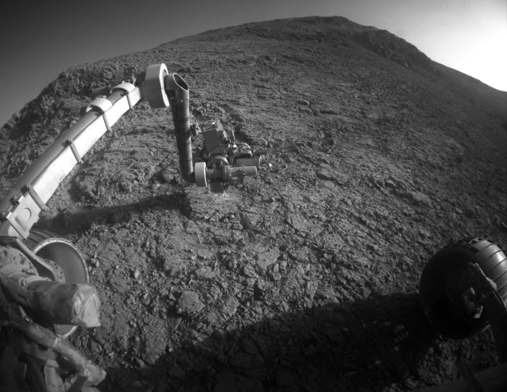 Opportunity examining the rock outcrop called "Private John Potts" on the southern side of Marathon Valley. The rover has just passed its 12th anniversary milestone and is still going strong. Photo Credit: NASA/JPL-Caltech