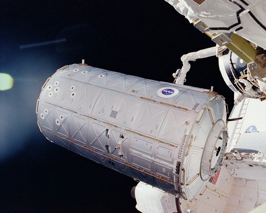 The Destiny laboratory is maneuvered towards its final location at the forward port of the Unity node in February 2001. Photo Credit: NASA, via Joachim Becker/SpaceFacts.de