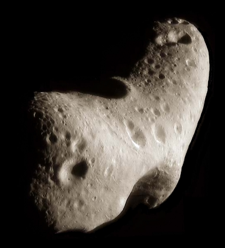 Asteroid 433 Eros, visited by the Near-Earth Asteroid Rendezvous (NEAR)-Shoemaker during 1998-2001. Photo Credit: NASA