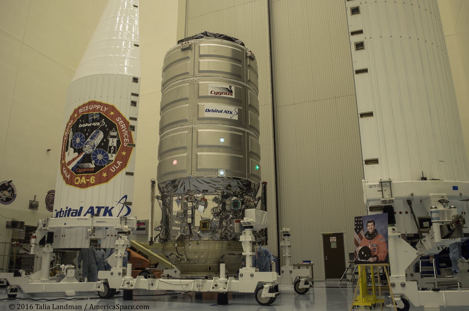 The Orbital ATK Cygnus resupply ship "S.S. Rick Husband", packed with 7,700 pounds of supplies, hardware and experiments, undergoing final processing in the KSC clean room March 8, ahead of its scheduled launch to the ISS atop a ULA Atlas-V booster from nearby Cape Canaveral Launch Complex 41 on the night of March 22. Photo Credit: Talia Landman / AmericaSpace