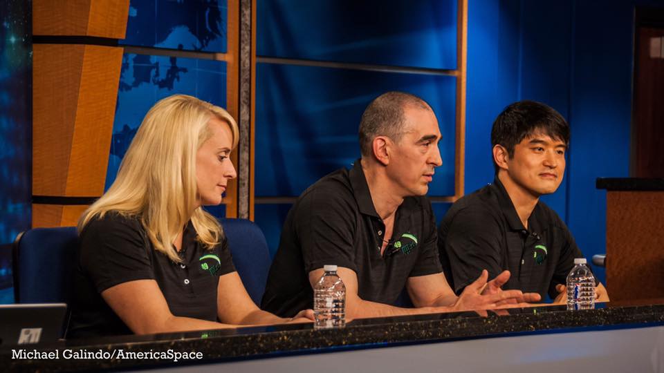 The crew were seated for the conference in the same configuration that they will adopt aboard the Soyuz-MS spacecraft. At the center is Commander Anatoli Ivanishin, with Flight Engineer-1 Takuya Onishi to his left and Flight Engineer-2 Kate Rubins to his right. Photo Credit: Michael Galindo/AmericaSpace