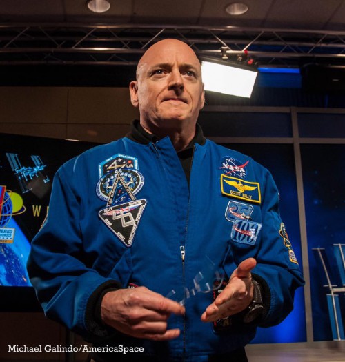 As seen by the patches on the right breast of his suit, Kelly's year in space spanned four ISS increments: Expeditions 43, 44, 45 and 46. For the last two of these increments, he served as the station commander. Photo Credit: Michael Galindo/AmericaSpace