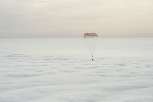 The Soyuz TMA-18M spacecraft is seen as it lands with Expedition 46 Commander Scott Kelly of NASA and Russian cosmonauts Mikhail Kornienko and Sergey Volkov of Roscosmos near the town of Zhezkazgan, Kazakhstan on Wednesday, March 2, 2016 (Kazakh time). Kelly and Kornienko completed an International Space Station record year-long mission to collect valuable data on the effect of long duration weightlessness on the human body that will be used to formulate a human mission to Mars. Volkov returned after spending six months on the station. Photo Credit: NASA/Bill Ingalls