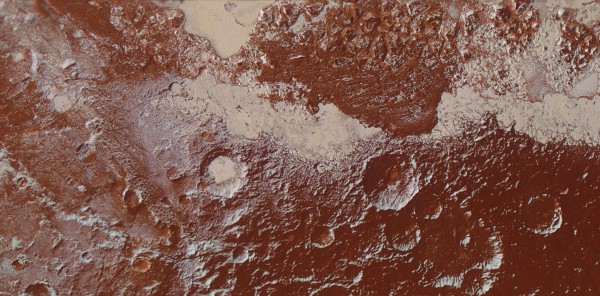 Enhanced color image of Pluto's surface, showing ice fields, mountains and craters. Image Credit: NASA/JHUAPL/SwRI