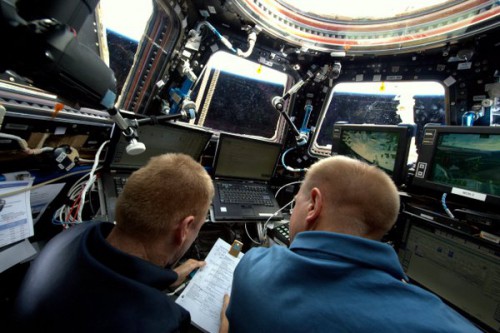 Today's rendezvous and berthing was led by Expedition 47 Commander Tim Kopra (right) and Britain's Tim Peake. Both were stationed at a Robotic Workstation (RWS) in the multi-windowed cupola. Photo Credit: NASA/Tim Peake/Twitter