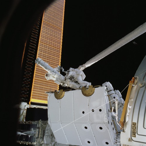 STS-100 spacewalkers Chris Hadfield and Scott Parazynski work with the Spacelab pallet, ahead of Canadarm2 installation. Photo Credit: NASA, via Joachim Becker/SpaceFacts.de