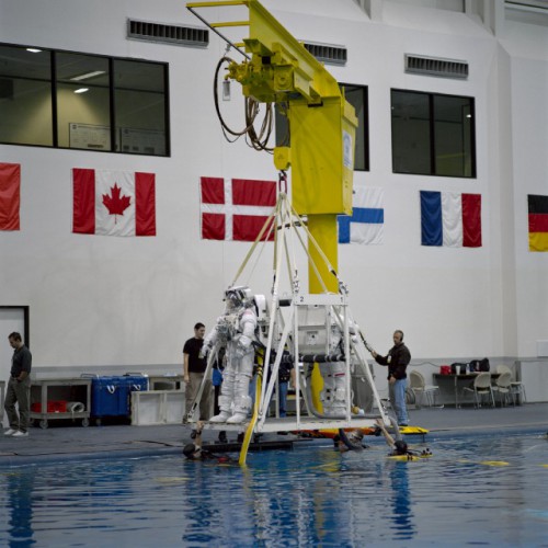 Chris Hadfield and Scott Parazynski prepare for a suited underwater EVA task in December 2000. Photo Credit: NASA 