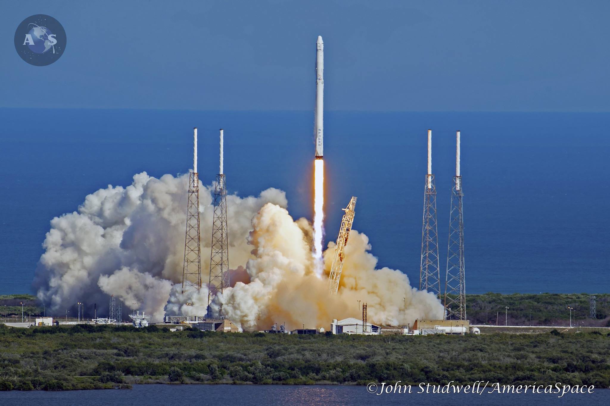 SpaceX's Falcon-9 flew into clear blue skies over Cape Canaveral AFS this afternoon, taking aim with Dragon for the CRS-8 mission to the ISS. The flight marked the first successful offshore barge landing for the company as well, marking the second time SpaceX has achieved a landing after launching from the Cape. Photo Credit: John Studwell / AmericaSpace
