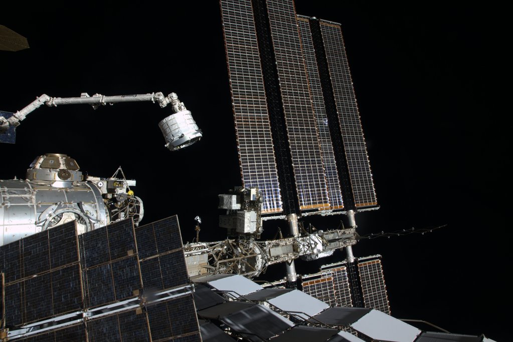 The Bigelow Expandable Activity Module (BEAM) is maneuvered by Canadarm2 on Saturday, 16 April, to its eventual location at the aft Common Berthing Mechanism (CBM) of the Tranquility node. It formed the 15th long-duration pressurized module to be attached to the International Space Station (ISS). Photo Credit: Tim Kopra/NASA/Twitter