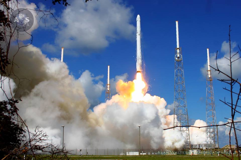 File photo, SpaceX launch of their Cargo Dragon capsule from Cape Canaveral AFS, Fla. The company is developing a crew version of their Dragon too, but in comments this week confirmed they won't be launching anyone on one for NASA until at least May 2018. Photo Credit: Alan Walters / AmericaSpace