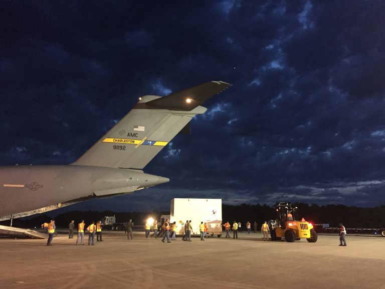 The OSIRIS-REx spacecraft is unloaded from a US Air Force C-17 at NASA’s Kennedy Space Center Shuttle Landing Facility. Credit: University of Arizona/Erin Morton