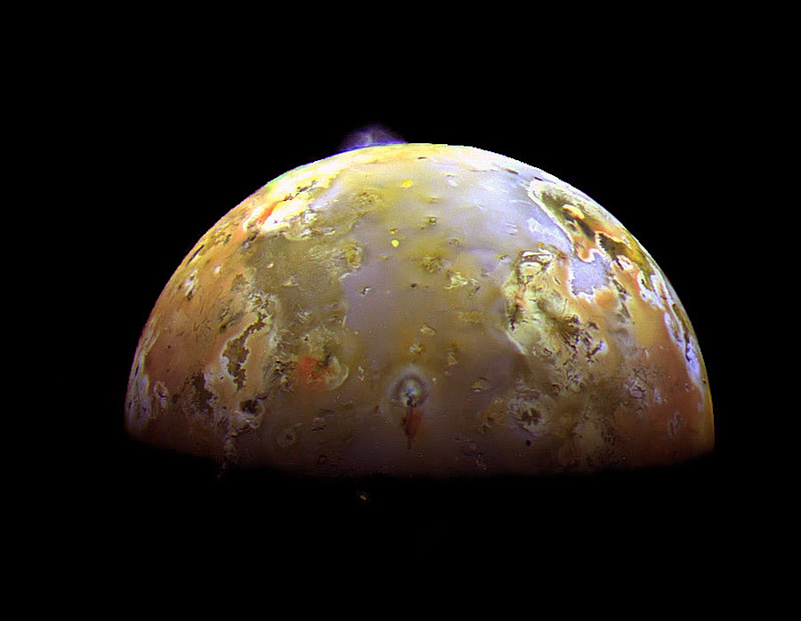 An impressive image of Jupiter's moon Io, as seen from NASA's Galileo spacecraft from a distance of approximately 600,000 km. A volcanic eruption is easily seen at the moon's upper limb, rising almost 140 km above the surface. A new study has shown that these volcanic eruptions play an integral role in the formation of mountains on the moon's landscape as well. Image Credit: Galileo Project, JPL, NASA